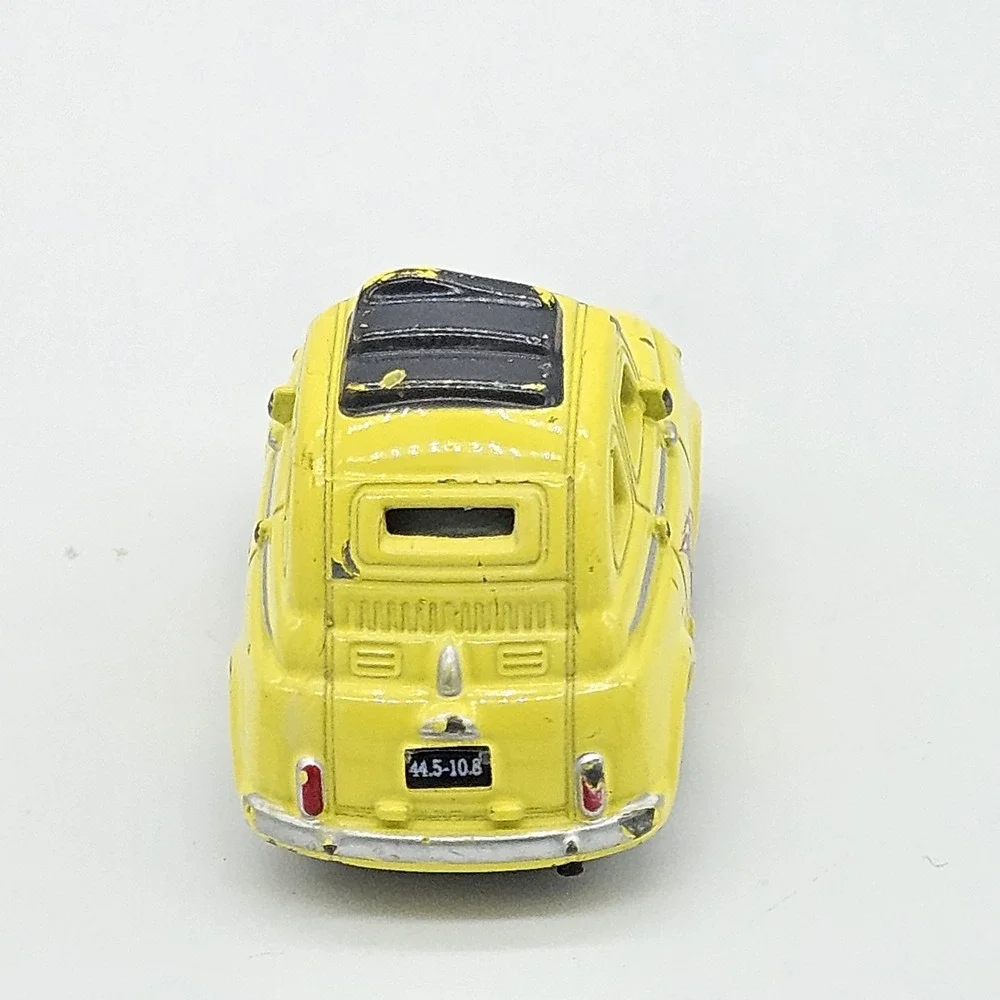 Disney Pixar Cars Luigi Yellow Diecast Car 95 Flame Side Toy Loose 2.5 Inch